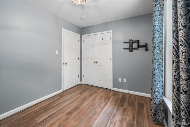 4508 Philips Path, Kents Store, VA 23084 - unfurnished bedroom with wood finished floors and a closet