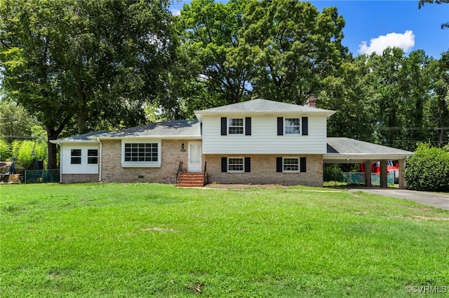 4816 Stornoway Dr, Ampthill, VA 23234 - split level home with a chimney, concrete driveway, an attached carport, and brick siding
