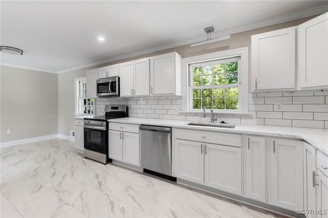 4816 Stornoway Dr, Ampthill, VA 23234 - kitchen with appliances with stainless steel finishes, backsplash, ornamental molding, white cabinets, and light marble finish floors