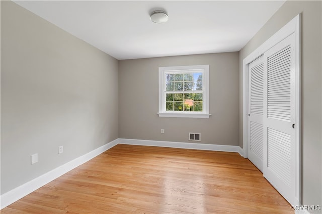 4816 Stornoway Dr, Ampthill, VA 23234 - unfurnished bedroom featuring light wood-style flooring and a closet