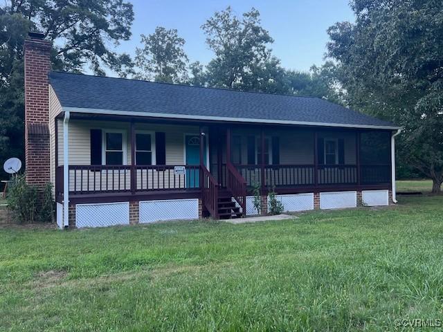 1781 Signboard Rd, Bumpass, VA 23024 - view of front of house featuring a porch, a chimney, a front lawn, and a shingled roof
