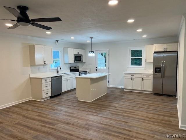1781 Signboard Rd, Bumpass, VA 23024 - kitchen with stainless steel appliances, white cabinets, recessed lighting, ceiling fan, and light countertops