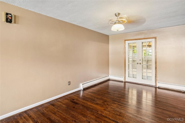 2407 Birchwood Rd, Henrico, VA 23294 - unfurnished room with baseboard heating, french doors, wood finished floors, and a baseboard heating unit