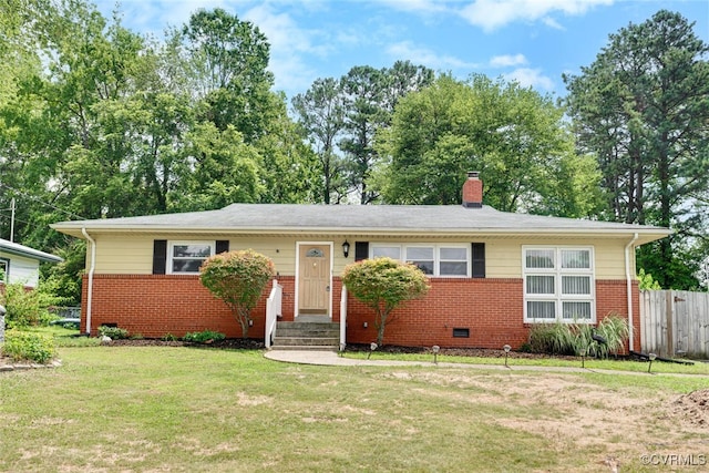 2407 Birchwood Rd, Henrico, VA 23294 - view of front of house featuring brick siding and a chimney