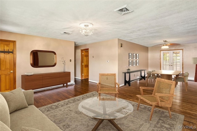 2407 Birchwood Rd, Henrico, VA 23294 - living room featuring a chandelier, wood finished floors, french doors, and a ceiling fan