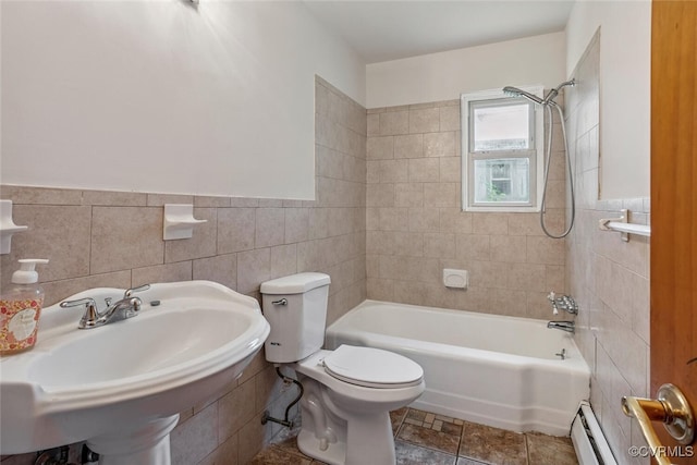 2407 Birchwood Rd, Henrico, VA 23294 - full bath with tile walls, a baseboard radiator, tub / shower combination, and a wainscoted wall