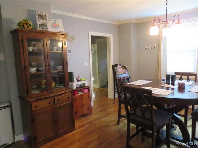 5900 River Rd, South Chesterfield, VA 23803 - dining space with wood finished floors and crown molding
