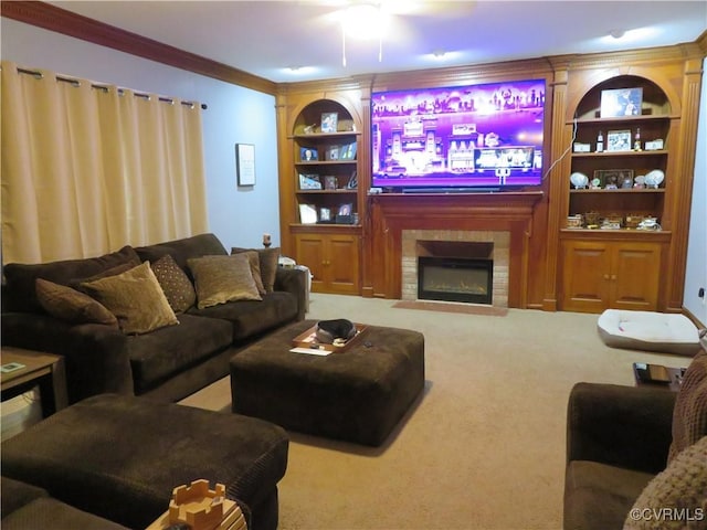 5900 River Rd, South Chesterfield, VA 23803 - carpeted living room featuring built in features, crown molding, a ceiling fan, and a fireplace