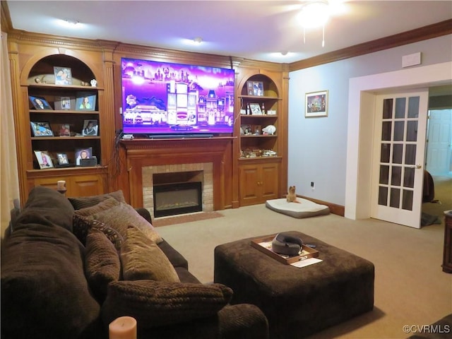 5900 River Rd, South Chesterfield, VA 23803 - carpeted living area with crown molding, built in shelves, a fireplace, and a ceiling fan