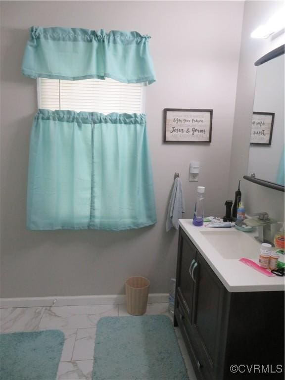 5900 River Rd, South Chesterfield, VA 23803 - bathroom with marble finish flooring and vanity