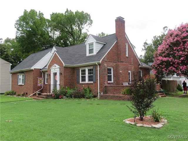 5900 River Rd, South Chesterfield, VA 23803 - view of front of house featuring brick siding, a chimney, and a front lawn