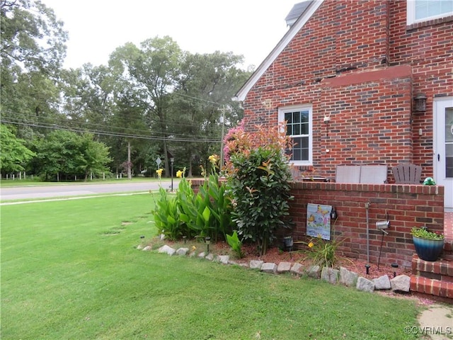 5900 River Rd, South Chesterfield, VA 23803 - view of side of property with brick siding and a yard