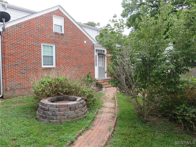 5900 River Rd, South Chesterfield, VA 23803 - view of yard featuring an outdoor fire pit