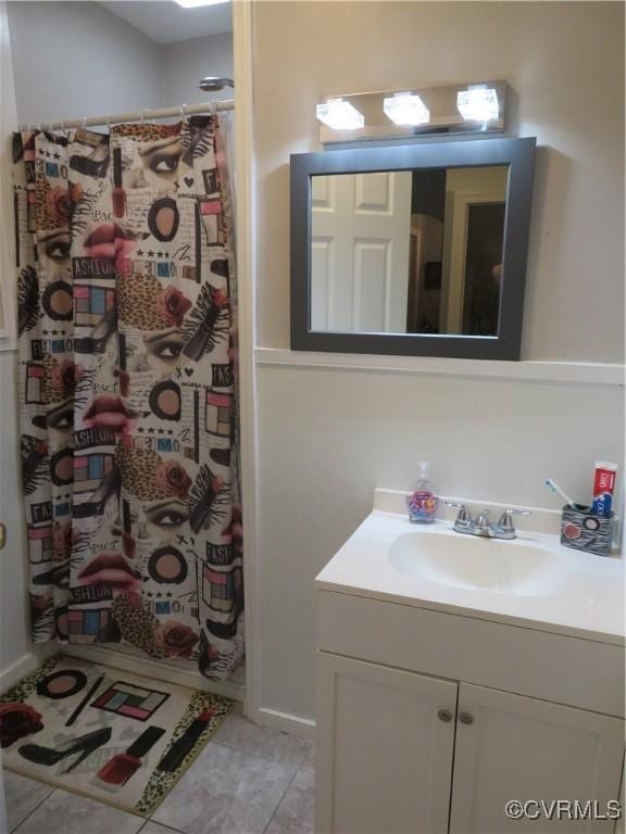 5900 River Rd, South Chesterfield, VA 23803 - full bath featuring vanity, tile patterned floors, and curtained shower