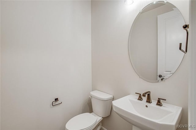 7127 Braxton Ct, Ladysmith, VA 22546 - half bath featuring a sink and toilet