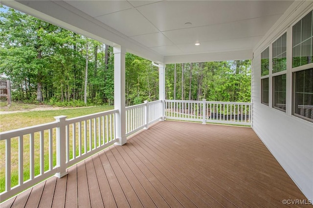7127 Braxton Ct, Ladysmith, VA 22546 - wooden porch with a yard