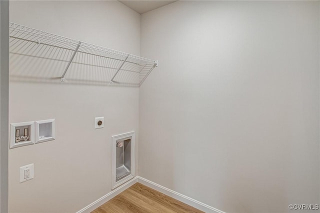 7127 Braxton Ct, Ladysmith, VA 22546 - laundry area with hookup for an electric dryer, hookup for a washing machine, and light wood-style floors