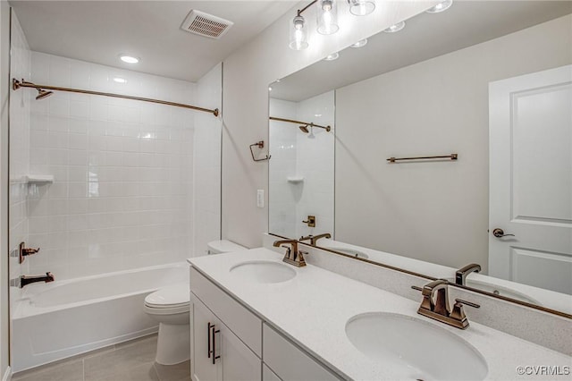 7127 Braxton Ct, Ladysmith, VA 22546 - bathroom featuring shower / washtub combination, double vanity, tile patterned floors, and recessed lighting