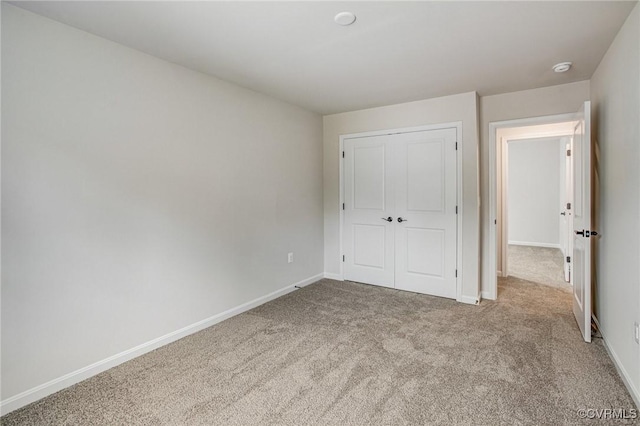 7127 Braxton Ct, Ladysmith, VA 22546 - unfurnished bedroom featuring carpet floors and a closet
