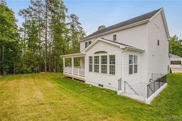 7127 Braxton Ct, Ladysmith, VA 22546 - rear view of house with a yard