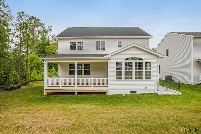 7127 Braxton Ct, Ladysmith, VA 22546 - rear view of house featuring a lawn and covered porch