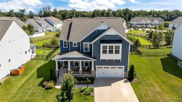 10109 Hollythorne Ln, Mechanicsville, VA 23116 - craftsman-style house with concrete driveway, a garage, stone siding, board and batten siding, and a residential view