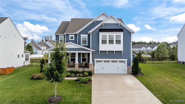 10109 Hollythorne Ln, Mechanicsville, VA 23116 - craftsman-style house featuring concrete driveway, an attached garage, board and batten siding, stone siding, and a porch