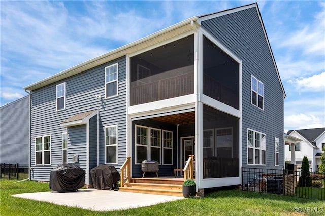 10109 Hollythorne Ln, Mechanicsville, VA 23116 - back of house featuring a sunroom and a patio area