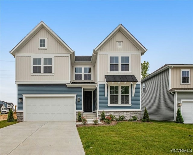 7107 Braxton Ct, Ladysmith, VA 22546 - craftsman-style house featuring a garage, driveway, a front yard, stone siding, and a standing seam roof