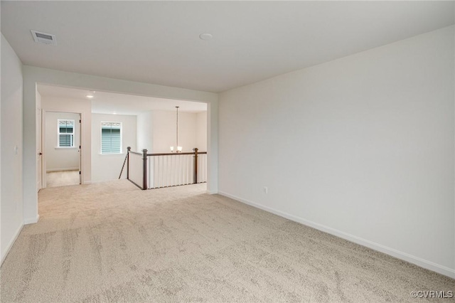 7107 Braxton Ct, Ladysmith, VA 22546 - carpeted spare room featuring a chandelier and baseboards