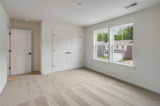 7107 Braxton Ct, Ladysmith, VA 22546 - unfurnished bedroom with carpet floors and a closet