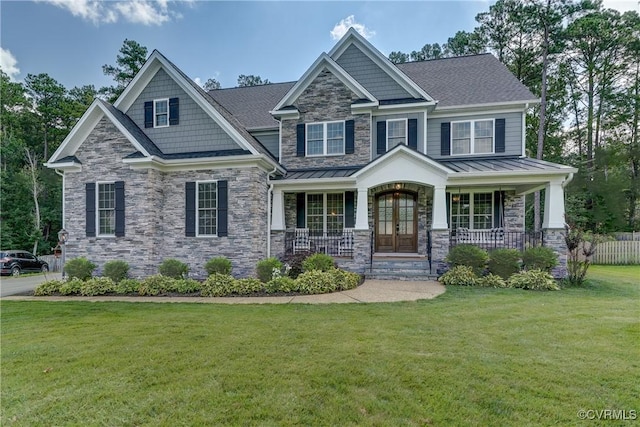 5025 Ellis Meadows Ct, Glen Allen, VA 23059 - craftsman house featuring stone siding, covered porch, and a front yard