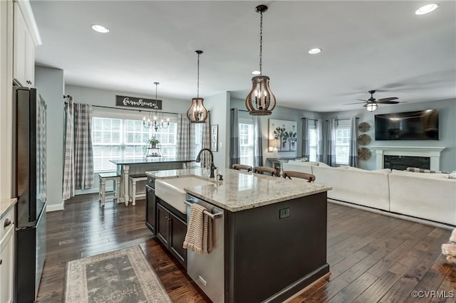 5025 Ellis Meadows Ct, Glen Allen, VA 23059 - kitchen featuring stainless steel dishwasher, ceiling fan, freestanding refrigerator, a chandelier, and dark wood finished floors