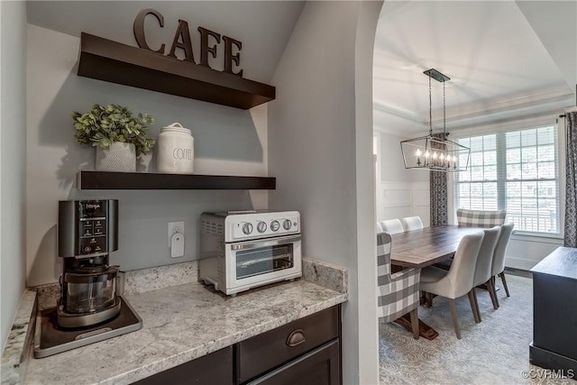 5025 Ellis Meadows Ct, Glen Allen, VA 23059 - dining space featuring a chandelier and a raised ceiling