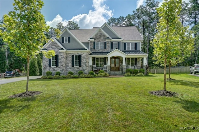 5025 Ellis Meadows Ct, Glen Allen, VA 23059 - craftsman-style house featuring stone siding, a standing seam roof, a porch, and french doors