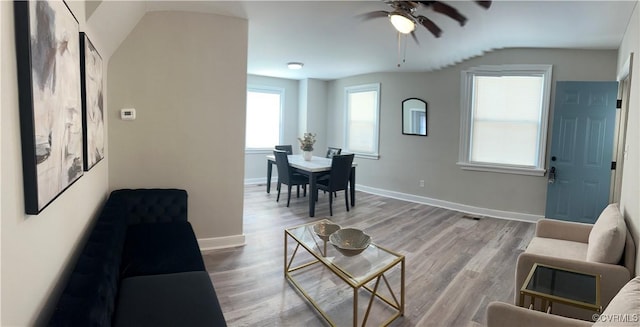 1883 Fairfax St, Petersburg, VA 23805 - living area featuring a ceiling fan, lofted ceiling, and light wood finished floors