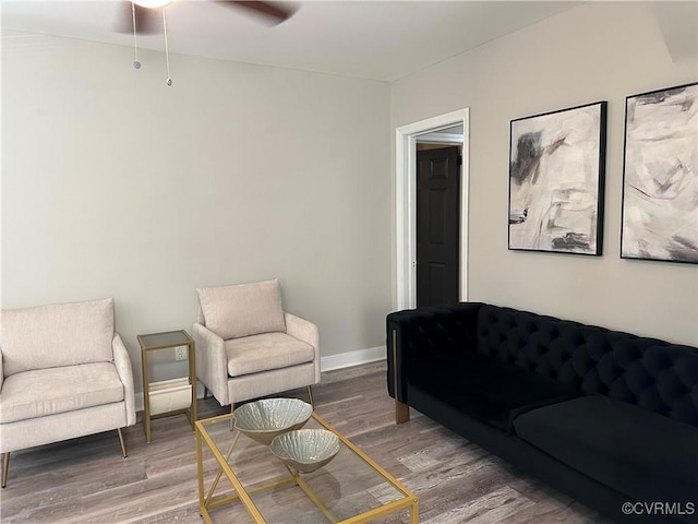 1883 Fairfax St, Petersburg, VA 23805 - living room with wood finished floors and a ceiling fan