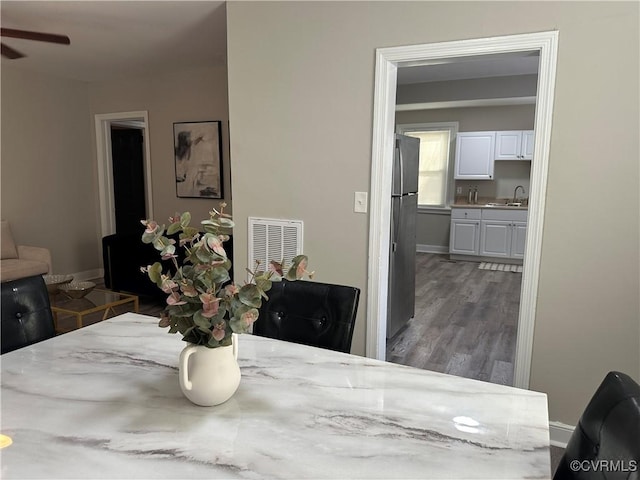 1883 Fairfax St, Petersburg, VA 23805 - dining area with wood finished floors and a ceiling fan