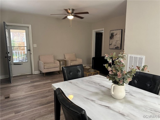 1883 Fairfax St, Petersburg, VA 23805 - dining room with wood finished floors and a ceiling fan