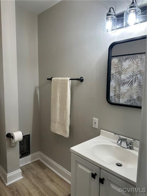 1883 Fairfax St, Petersburg, VA 23805 - bathroom featuring wood finished floors and vanity