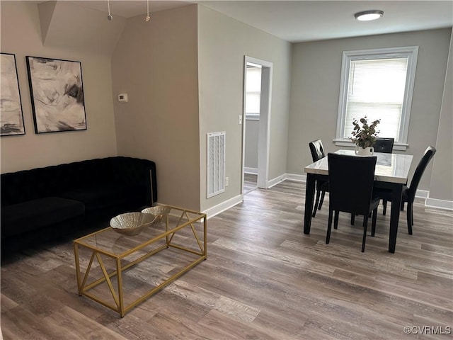 1883 Fairfax St, Petersburg, VA 23805 - dining room featuring plenty of natural light and wood finished floors
