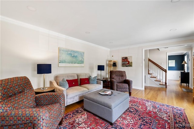 6213 Monument Ave, Richmond, VA 23226 - living room featuring wood finished floors, crown molding, and stairway