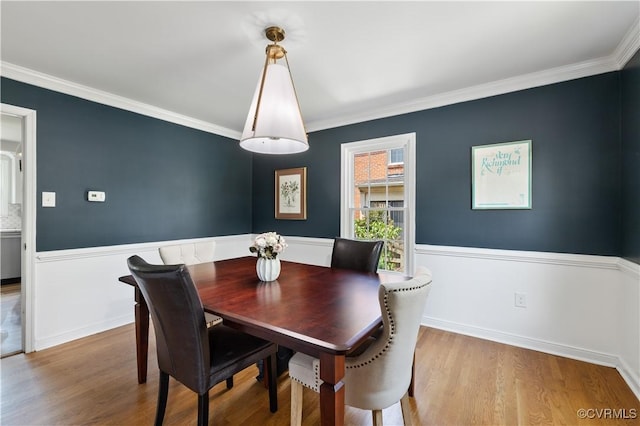 6213 Monument Ave, Richmond, VA 23226 - dining area featuring wood finished floors and ornamental molding