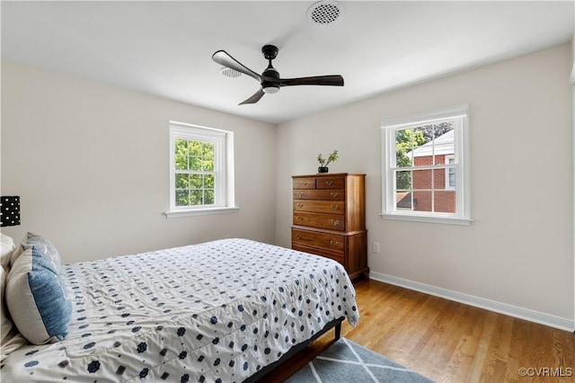 6213 Monument Ave, Richmond, VA 23226 - bedroom with wood finished floors and a ceiling fan