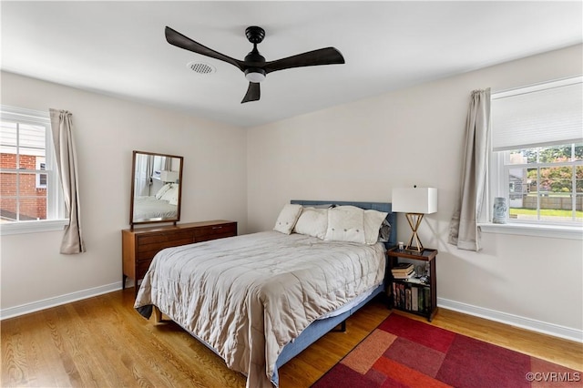 6213 Monument Ave, Richmond, VA 23226 - bedroom with wood finished floors and ceiling fan