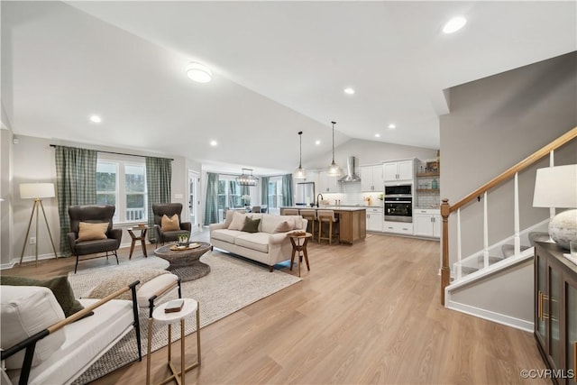 LOT47 Wendenburg Cir Lot 47, King William, VA 23009 - living room featuring vaulted ceiling, light wood-style floors, recessed lighting, and a chandelier