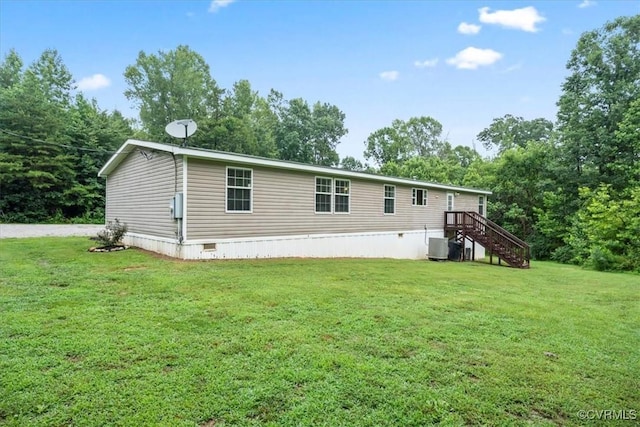 4627 Powhatan Lakes Rd Unit B, Powhatan, VA 23139 - back of property featuring stairs and a yard