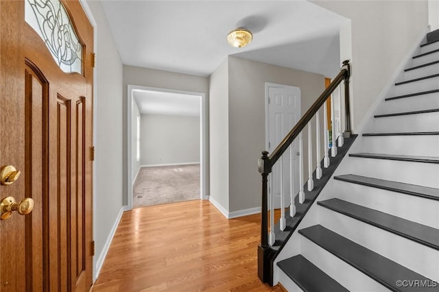 7906 Belmont Stakes Dr, Midlothian, VA 23112 - foyer entrance featuring light wood-style floors and stairs