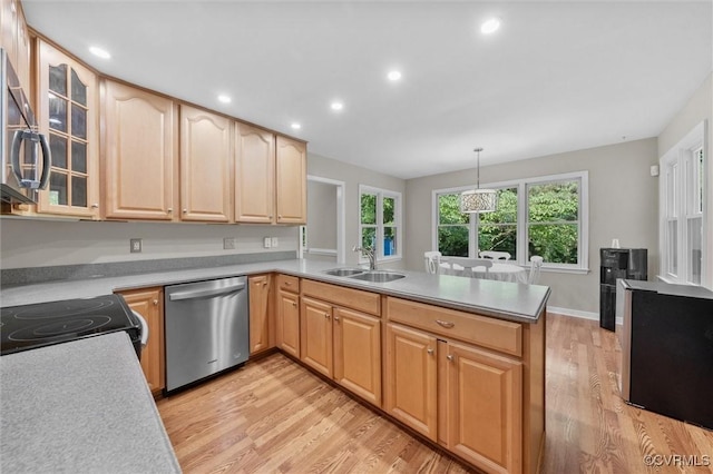 7906 Belmont Stakes Dr, Midlothian, VA 23112 - kitchen featuring a peninsula, stainless steel appliances, light wood-type flooring, glass insert cabinets, and light brown cabinetry