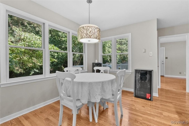 7906 Belmont Stakes Dr, Midlothian, VA 23112 - dining area featuring wine cooler and light wood-style floors